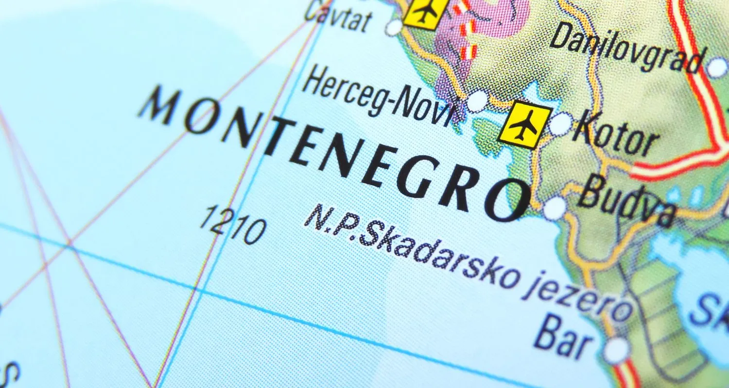 Close-up of a map showing Montenegro's location in the Western Balkans, highlighting key cities and airports